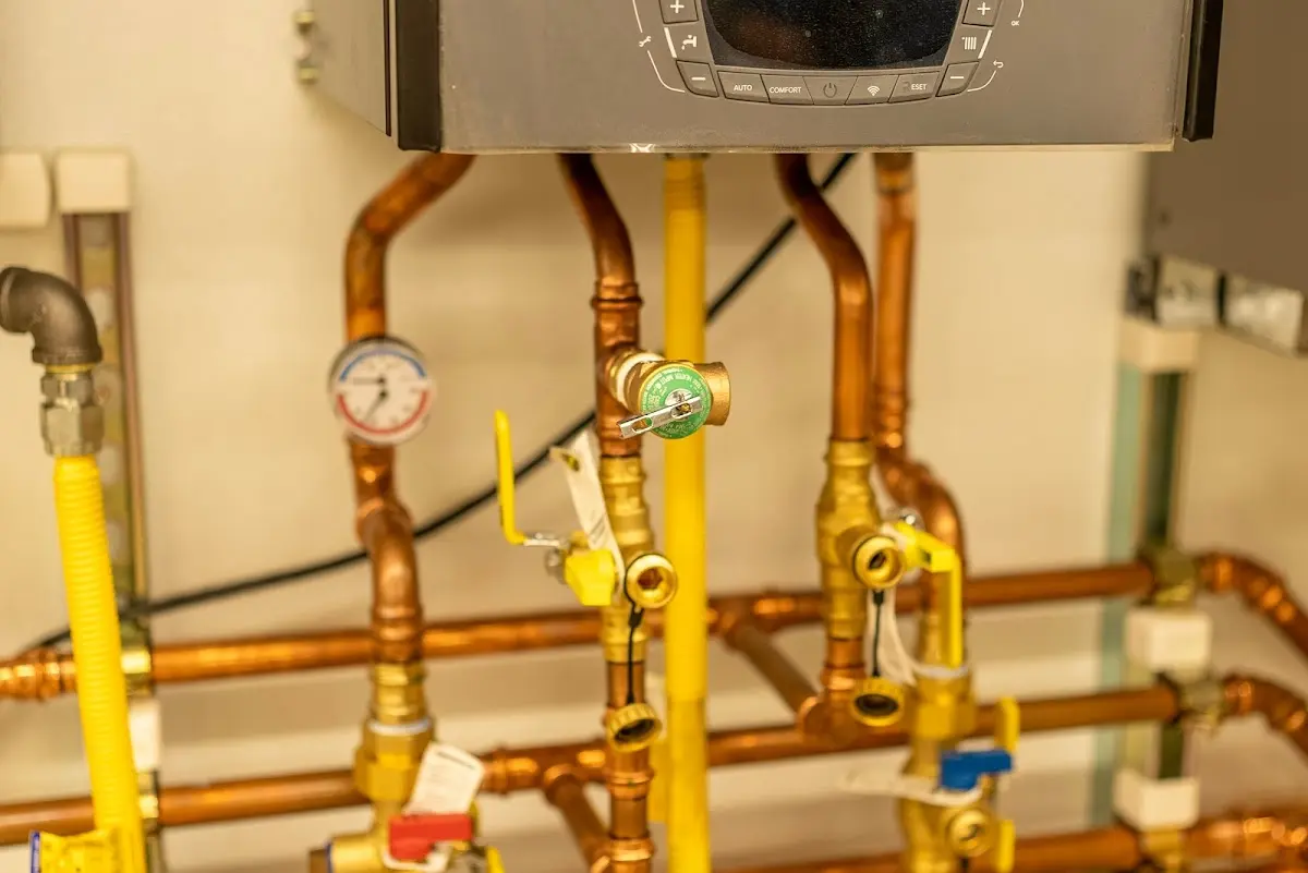 Licensed technician providing Water Heater Installation for a homeowner in Belding